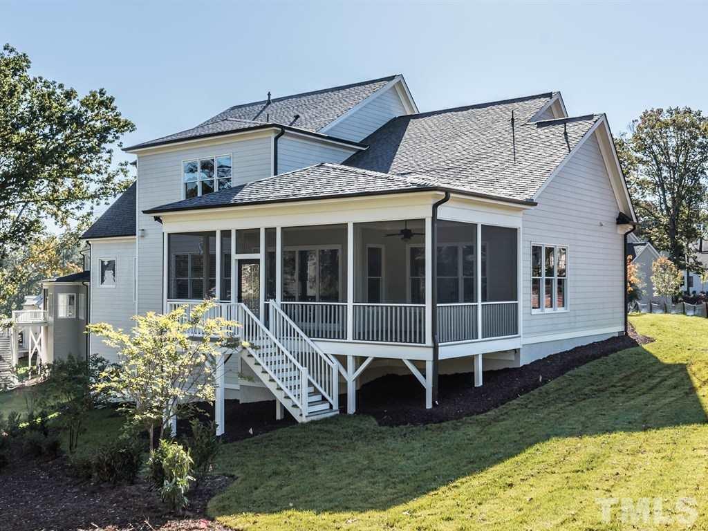 5216 Woodall Way, Unit 13 Raleigh, NC 27613 - Photo 22 of 25 a house view with a garden space