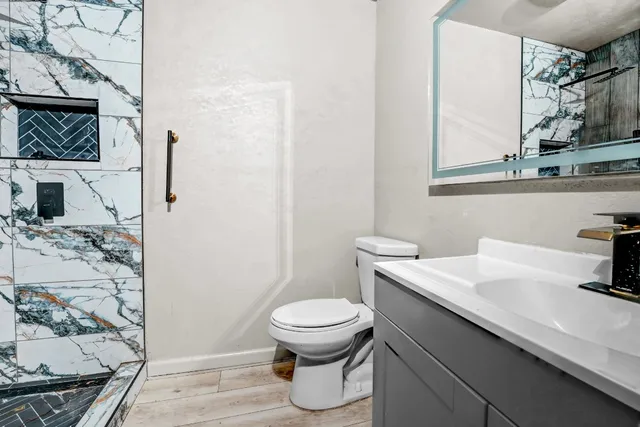 a bathroom with a sink and a toilet