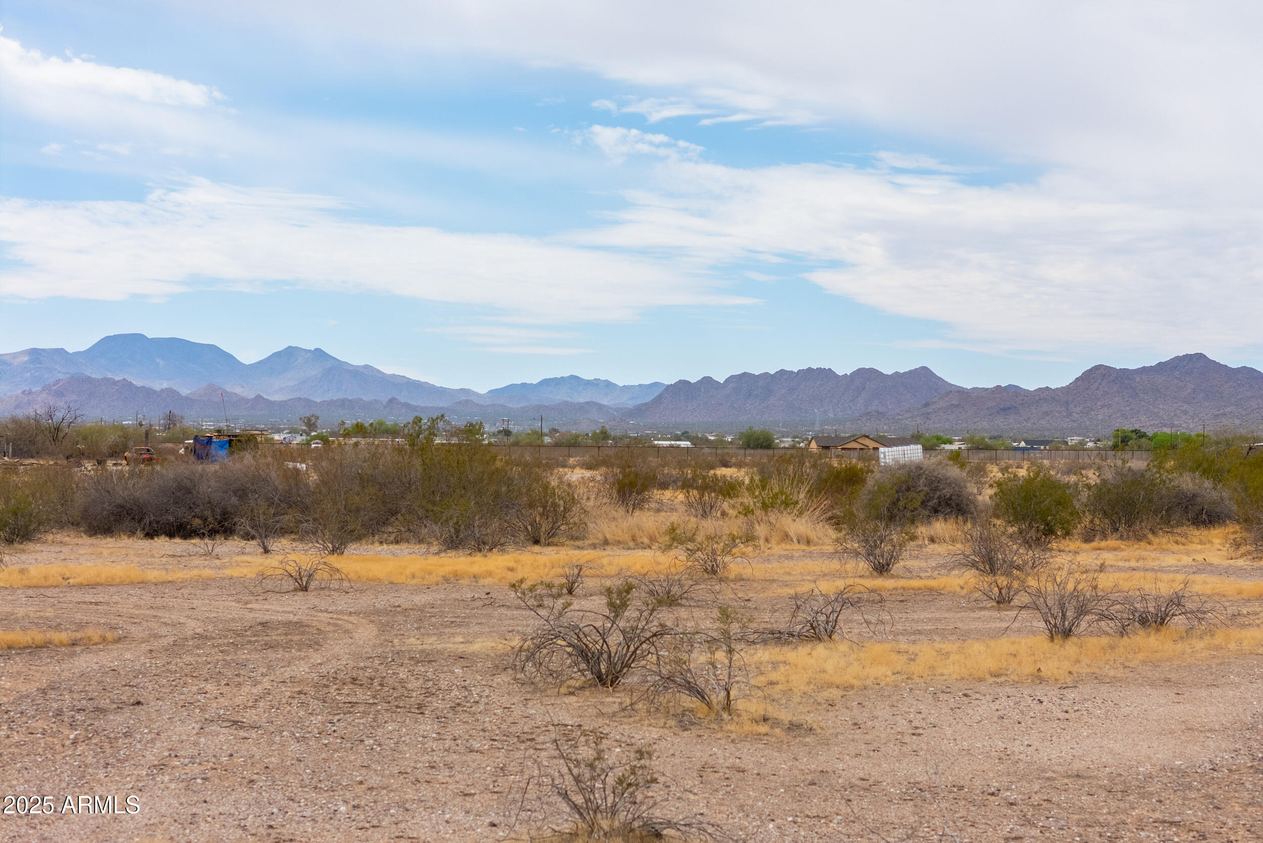 7640 North La Burma Road Maricopa, AZ 85139 - Photo 3 of 20 a view of lake with mountain