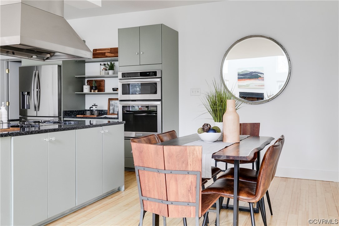 8312 Gwinnett Road Henrico, VA 23229 - Photo 11 of 50 a view of a dining room with furniture and wooden floor
