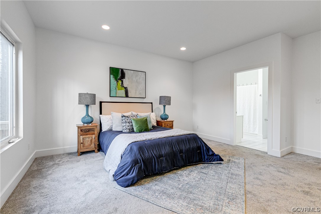 8312 Gwinnett Road Henrico, VA 23229 - Photo 18 of 50 a bedroom with a bed and window