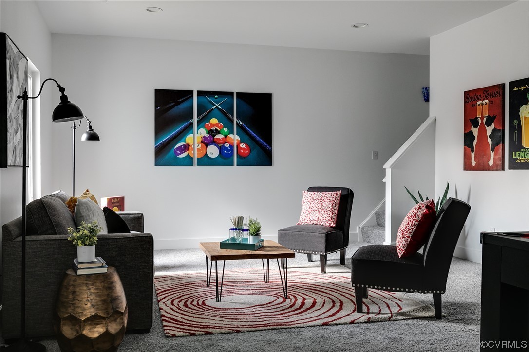 8312 Gwinnett Road Henrico, VA 23229 - Photo 20 of 50 a living room with furniture and a painting on the wall