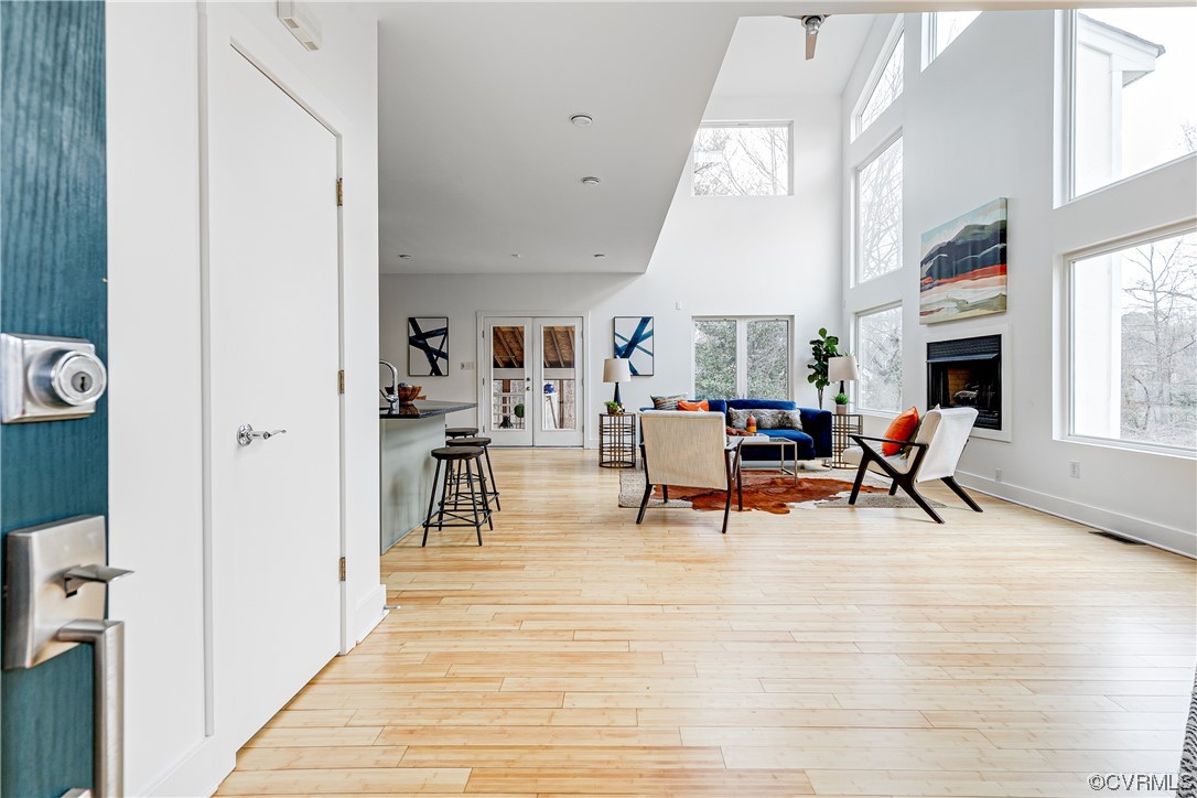 8312 Gwinnett Road Henrico, VA 23229 - Photo 4 of 50 a living room with furniture a dining table and chairs with wooden floor
