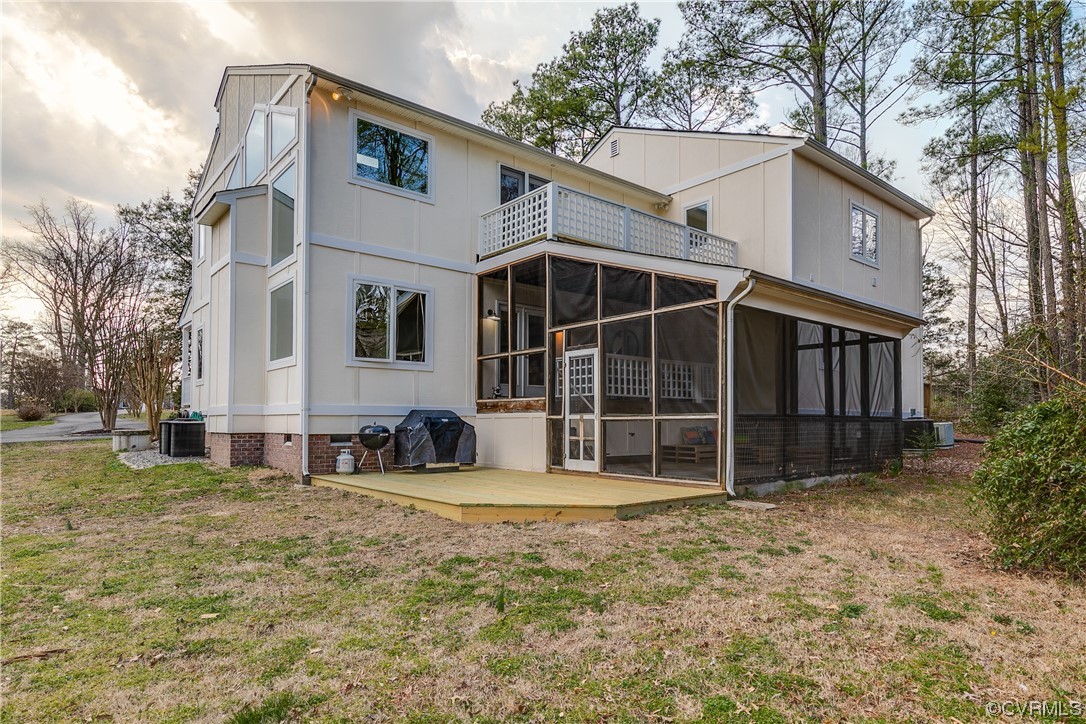8312 Gwinnett Road Henrico, VA 23229 - Photo 41 of 50 a view of a house with a yard and large tree