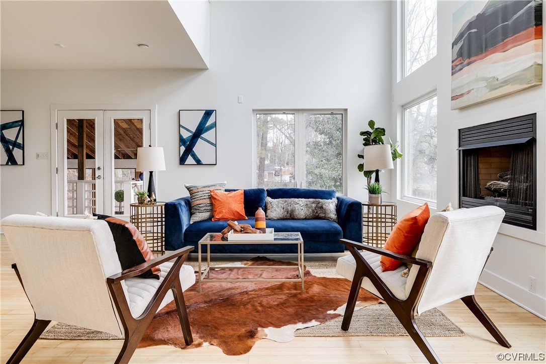 8312 Gwinnett Road Henrico, VA 23229 - Photo 7 of 50 a living room with furniture and a fireplace
