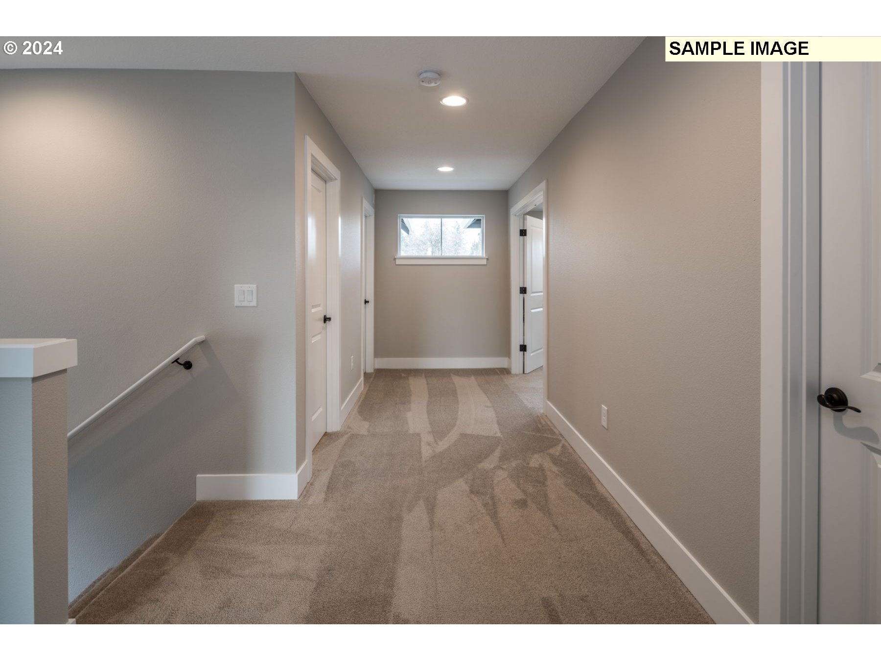 1018 South 46th Place Ridgefield, WA 98642 - Photo 11 of 34 a view of hallway with wooden floor