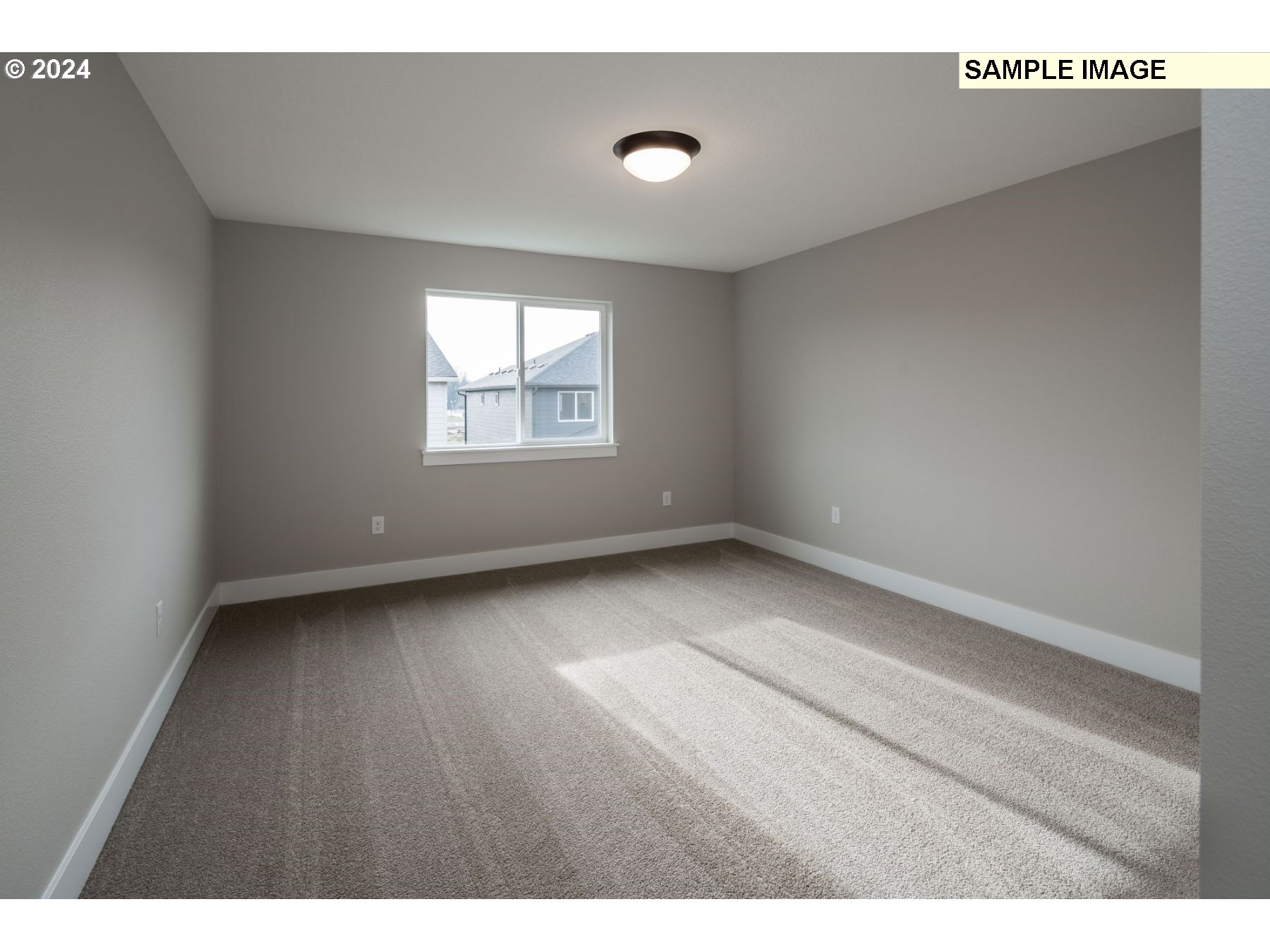 1018 South 46th Place Ridgefield, WA 98642 - Photo 19 of 34 a view of an empty room with a window