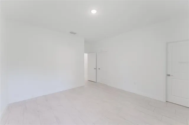 an empty room with an entryway