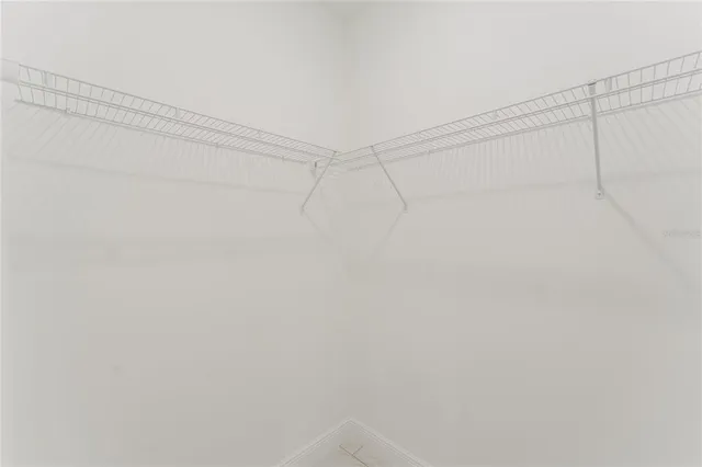 a view of a room with racks on the wall
