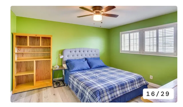 a bathroom with a sink a mirror and a shower