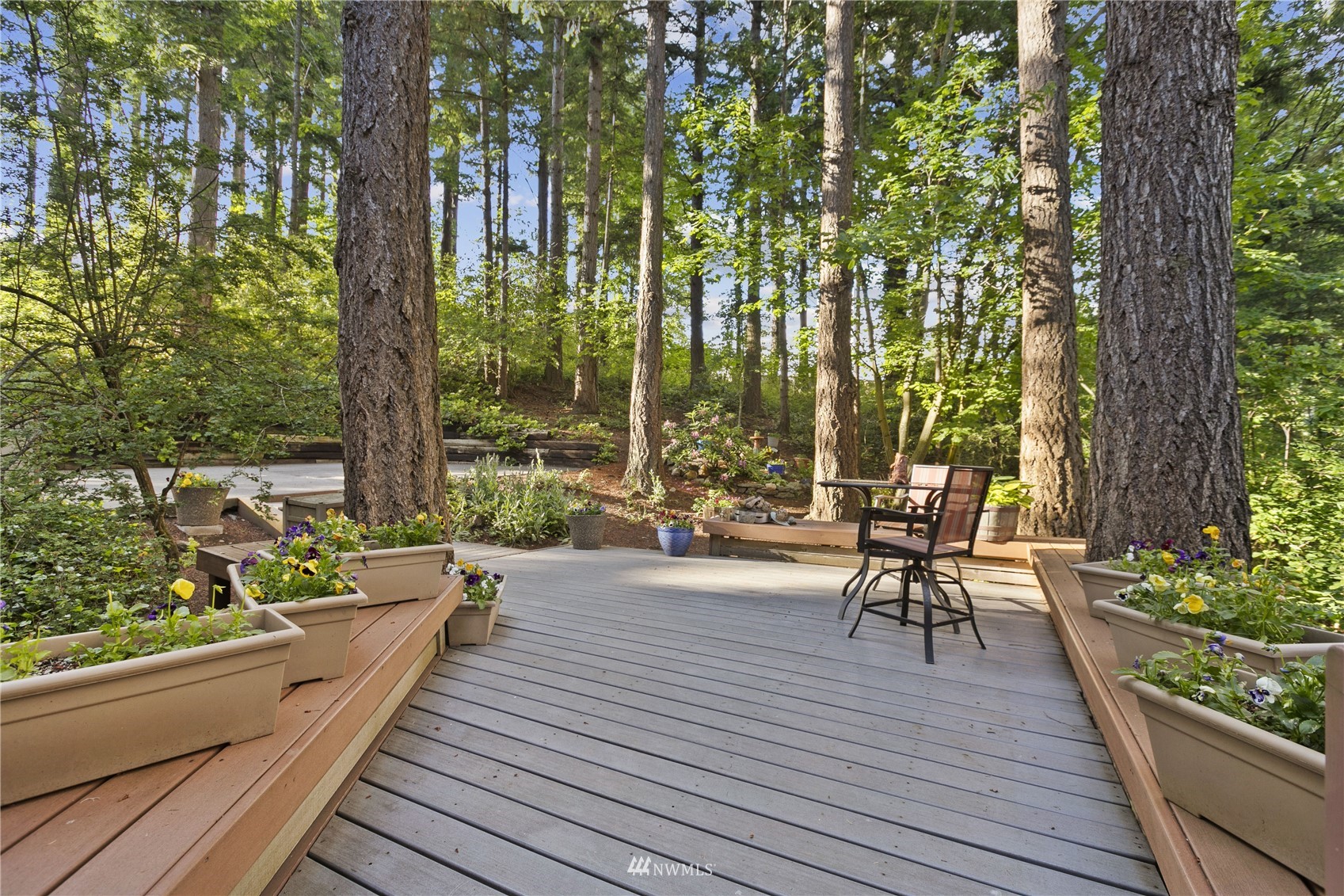 621 Willow Road Bellingham, WA 98225 - Photo 28 of 33 a view of balcony with chairs and wooden floor
