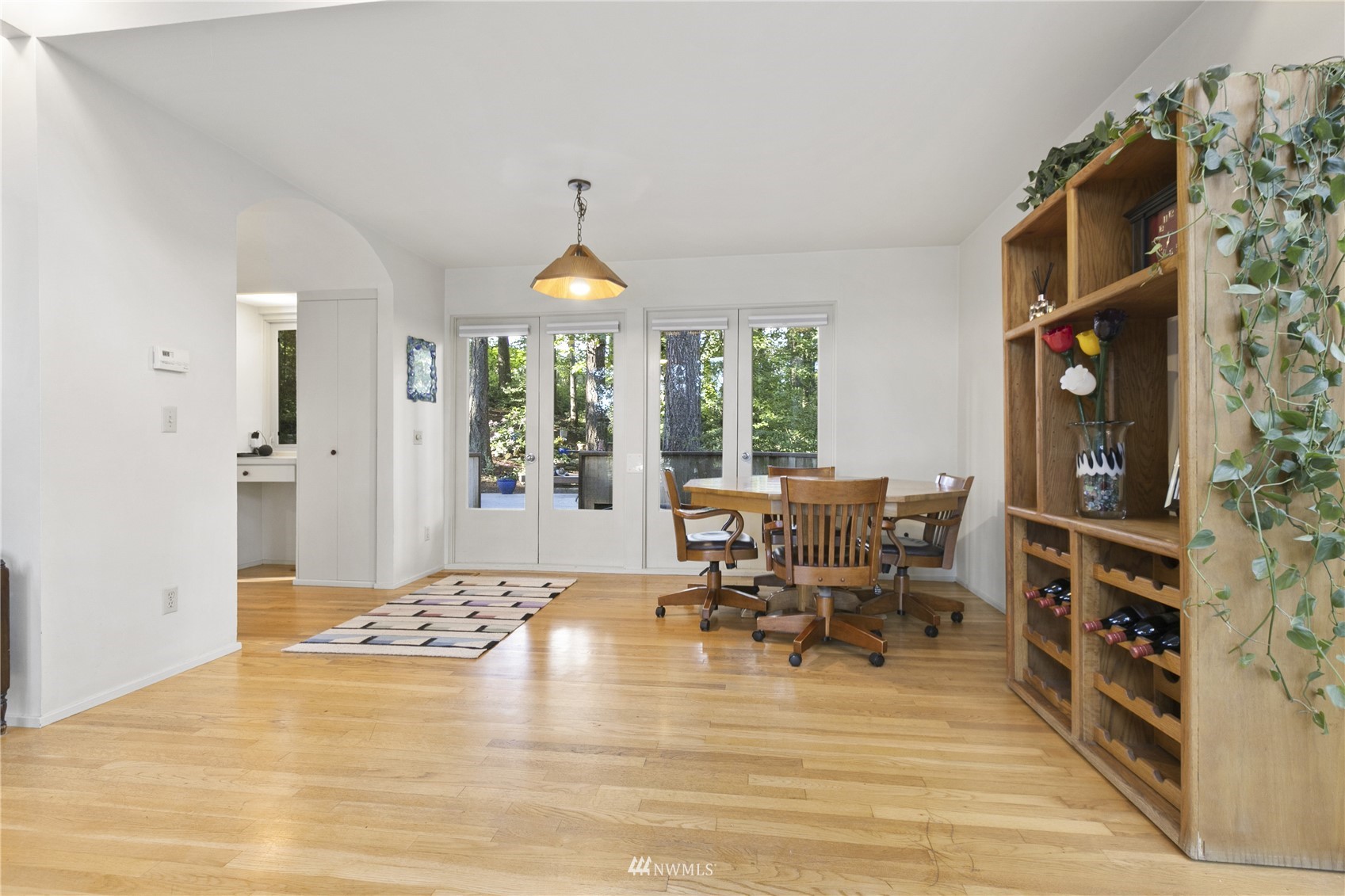 621 Willow Road Bellingham, WA 98225 - Photo 8 of 33 a view of a dining room with furniture window and wooden floor