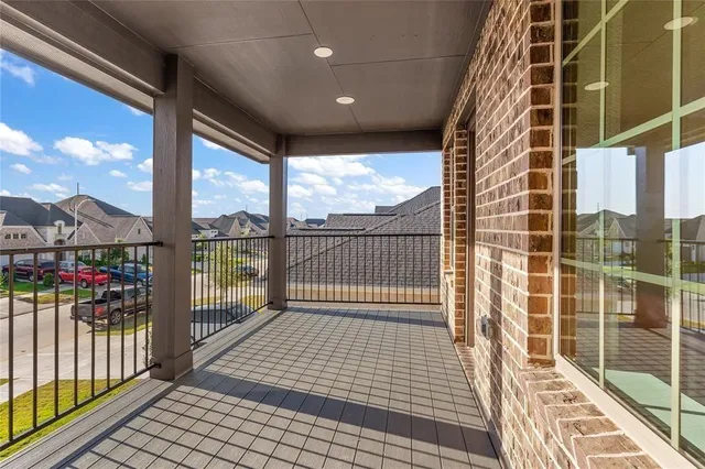 a view of a yard with a large tree