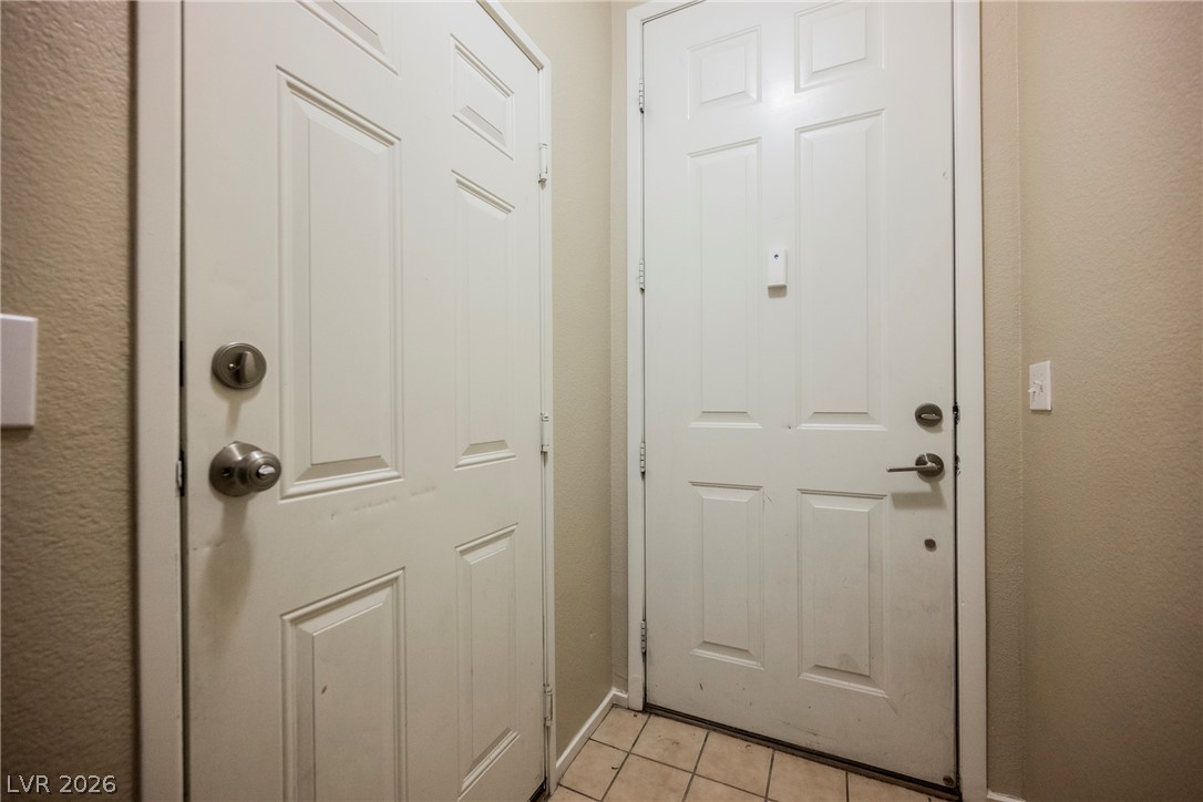 6320 Snap Ridge Street, Unit 201 North Las Vegas, NV 89081 - Photo 37 of 56 A welcoming entryway with durable tiled flooring.