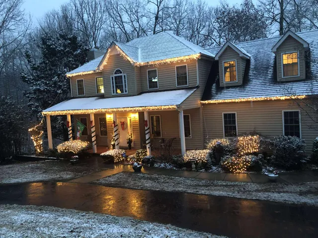 front view of a house with a yard
