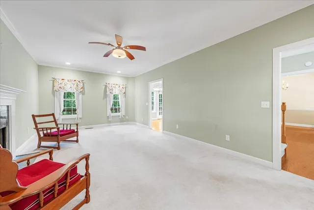 a bathroom with a bathtub and a window