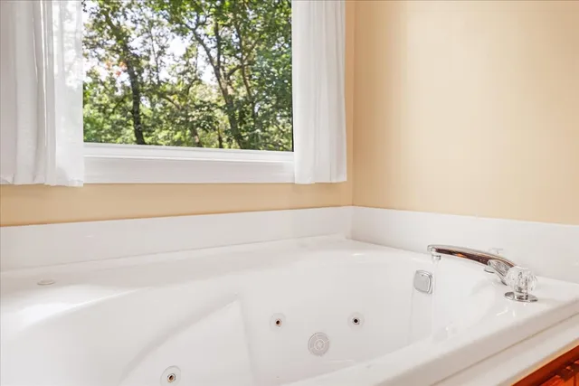a view of a house with garden and plants
