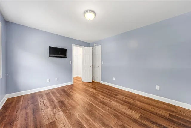 front view of a house and a yard