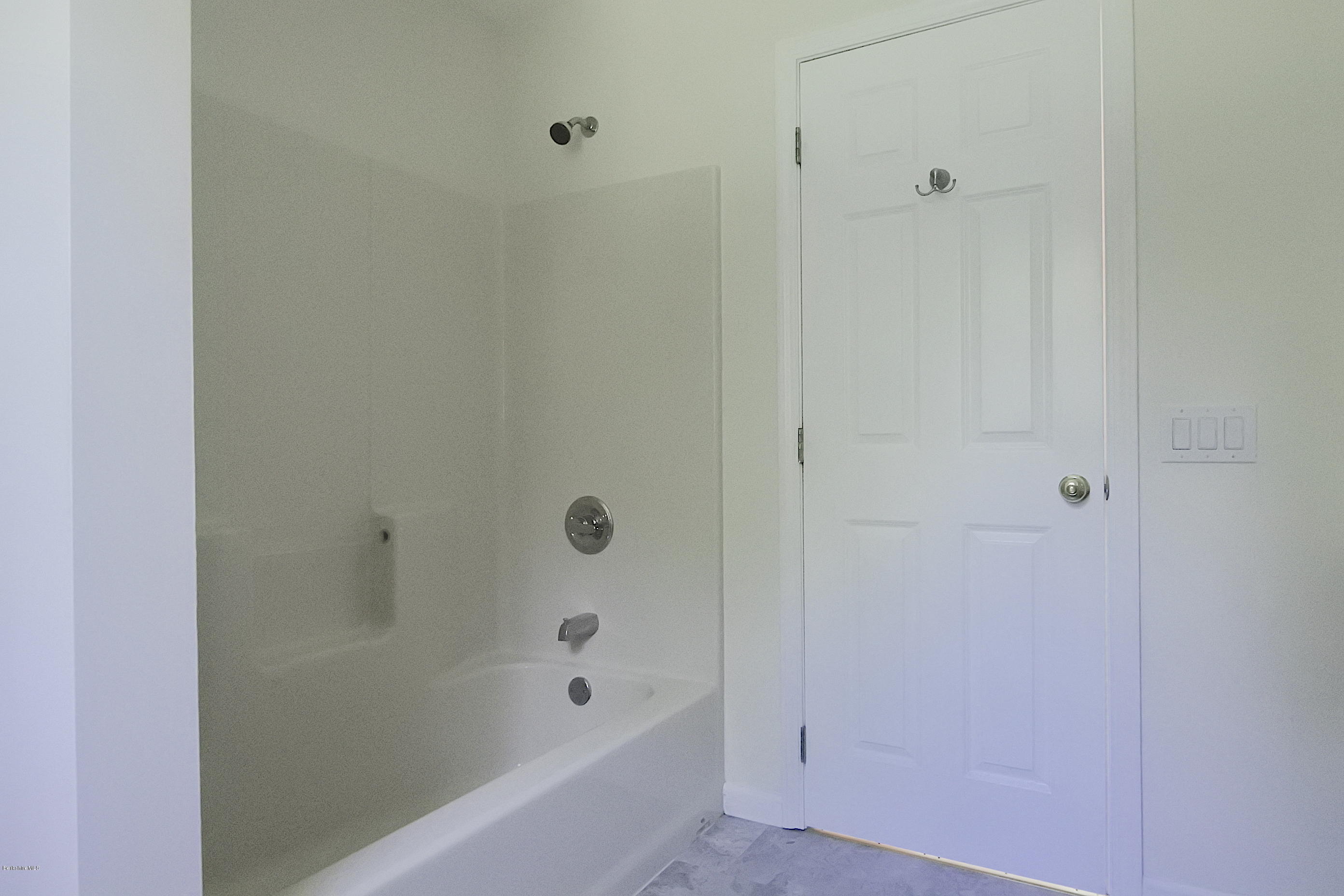 24 Housatonnuck Road Stockbridge, MA 01262 - Photo 16 of 36 a bathroom with a bathtub