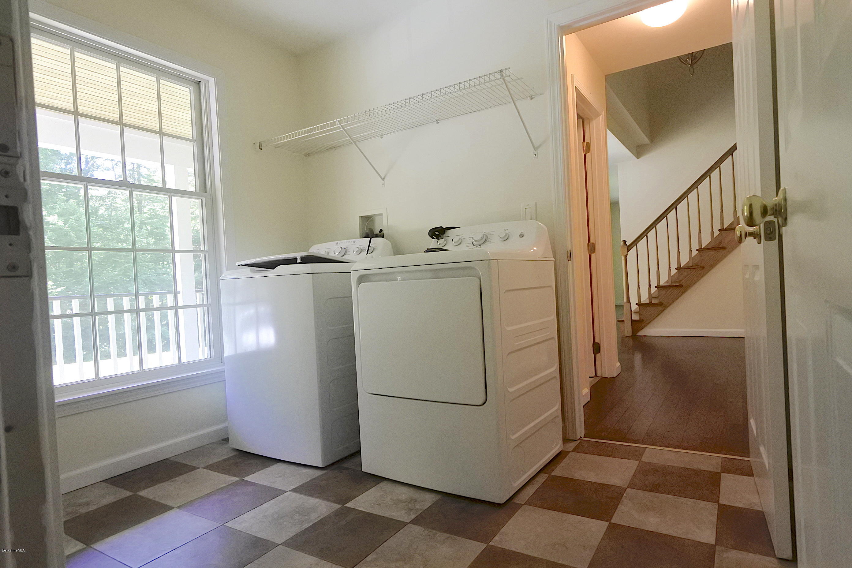 24 Housatonnuck Road Stockbridge, MA 01262 - Photo 27 of 36 a utility room with cabinets