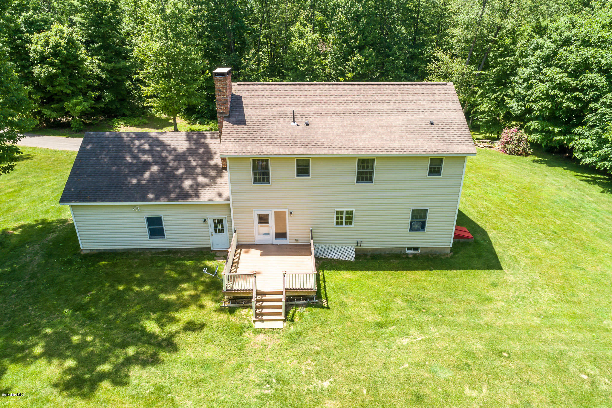 24 Housatonnuck Road Stockbridge, MA 01262 - Photo 4 of 36 an aerial view of a house with swimming pool garden and patio