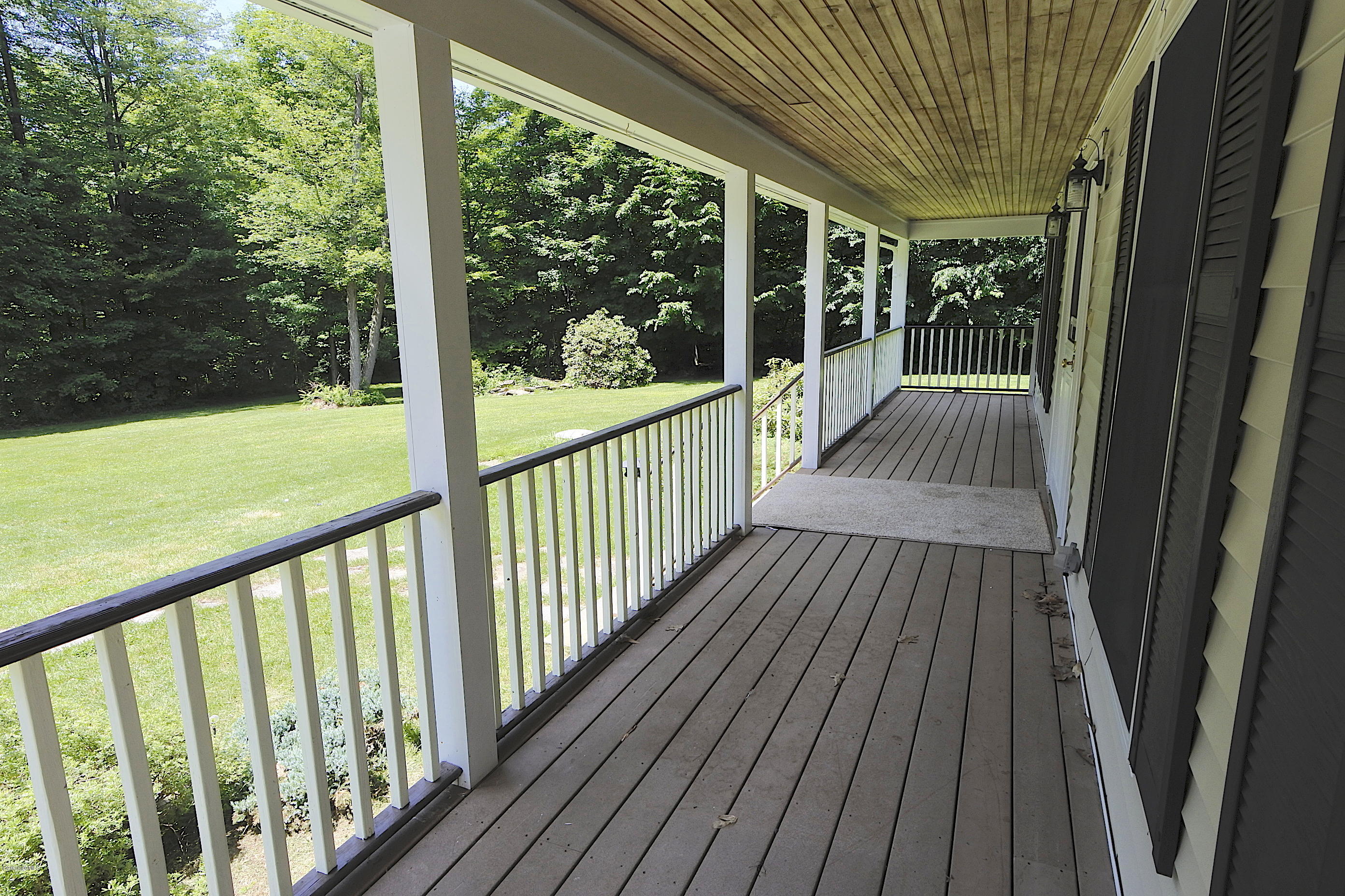 24 Housatonnuck Road Stockbridge, MA 01262 - Photo 6 of 36 a view of balcony with wooden floor