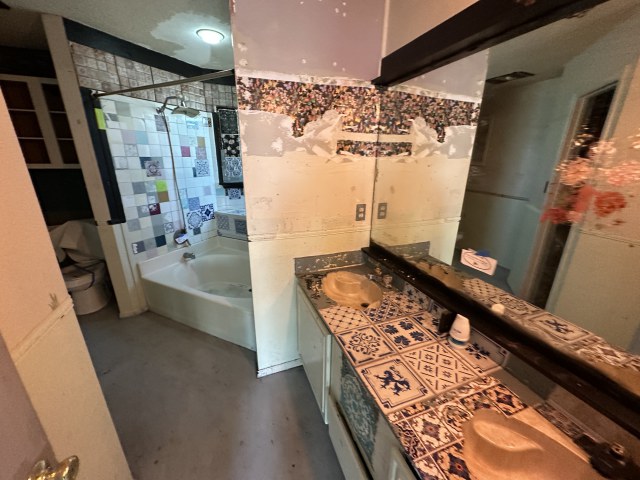 548 Spring River Drive Martindale, TX 78655 - Photo 13 of 17 a bathroom with a bathtub and shower