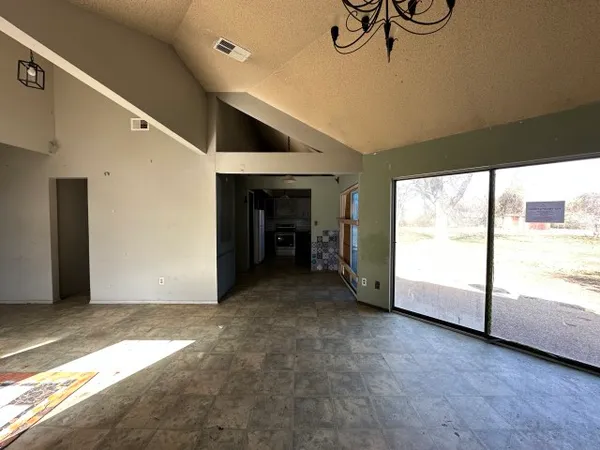 a view of a room with an empty space