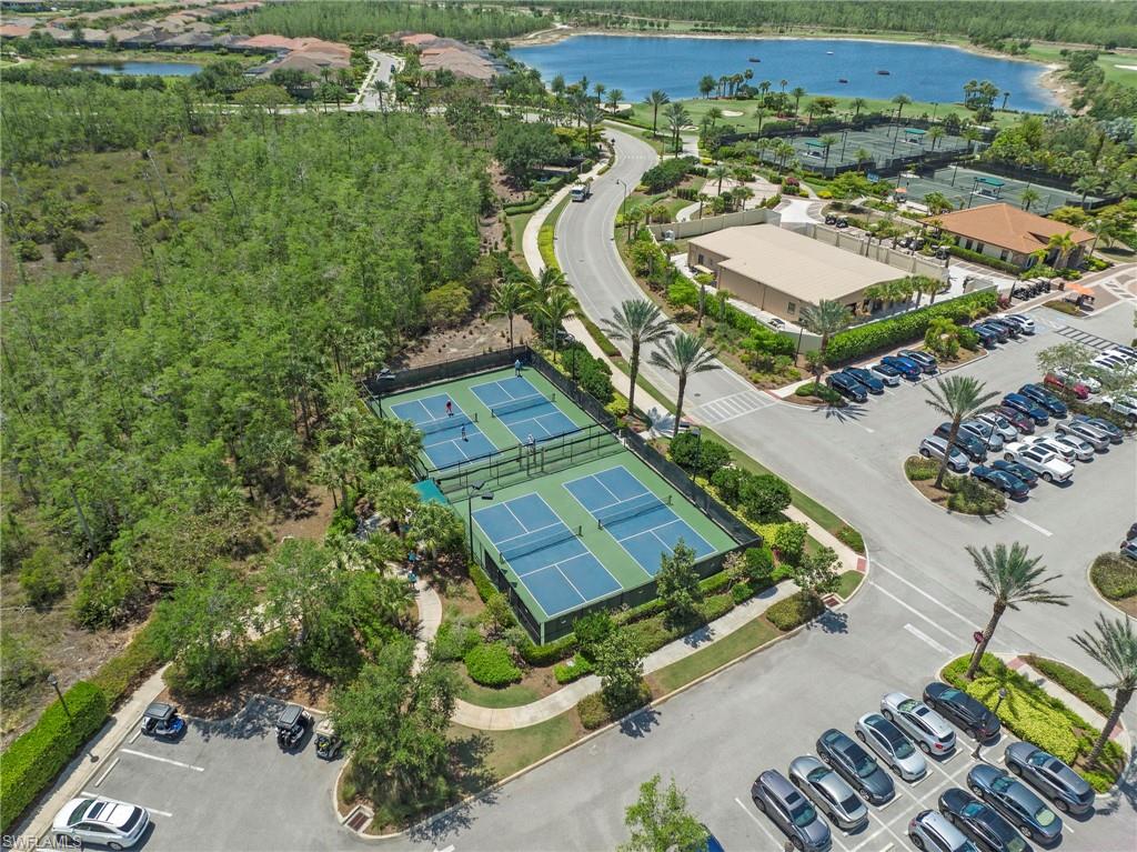 9366 Pocida Court, Unit 202 Naples, FL 34119 - Photo 37 of 44 an aerial view of a residential houses with outdoor space
