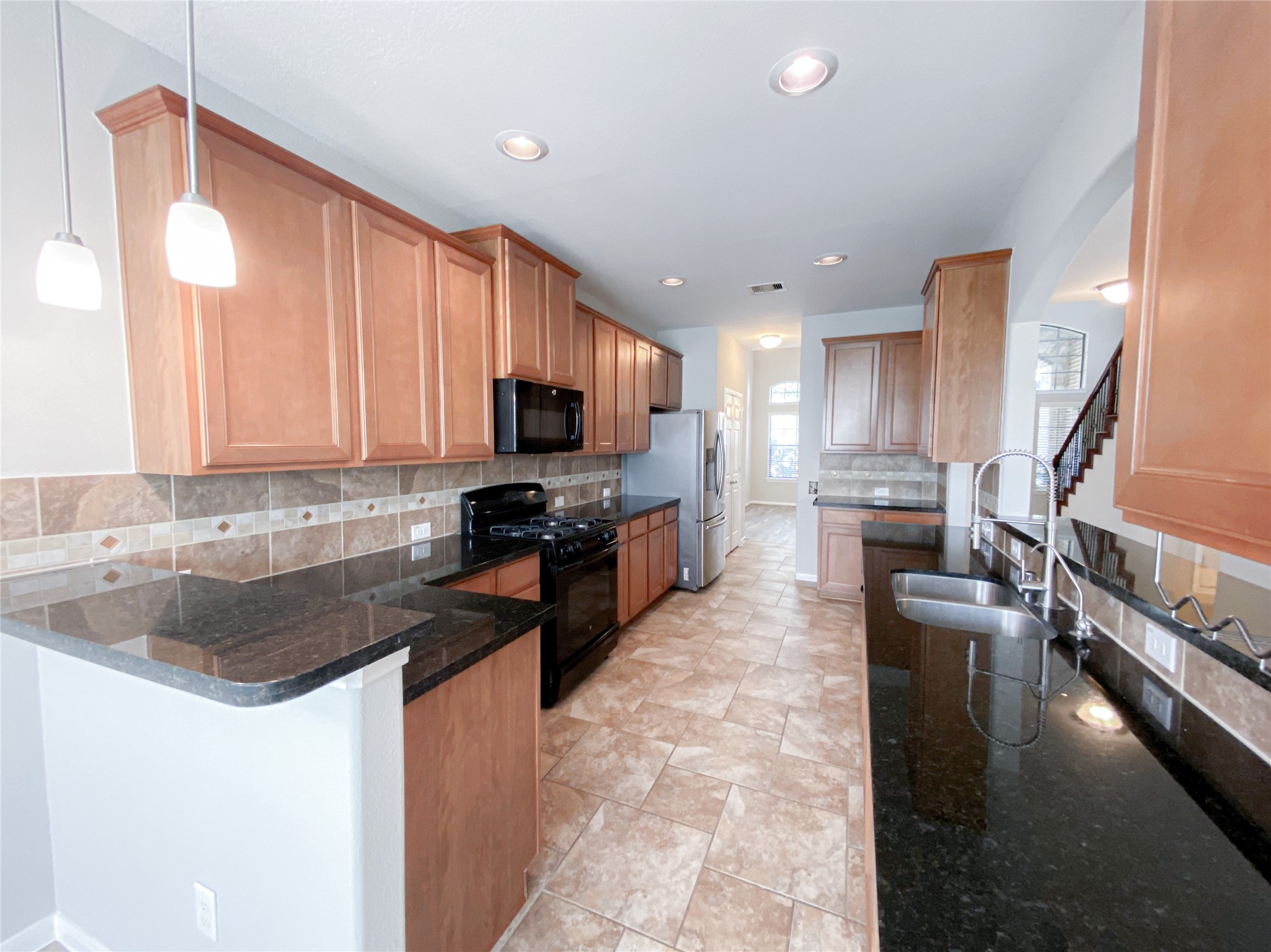 6227 Carnaby Lane Rosenberg, TX 77471 - Photo 11 of 30 Breakfast bar in the kitchen, lots of countertop space