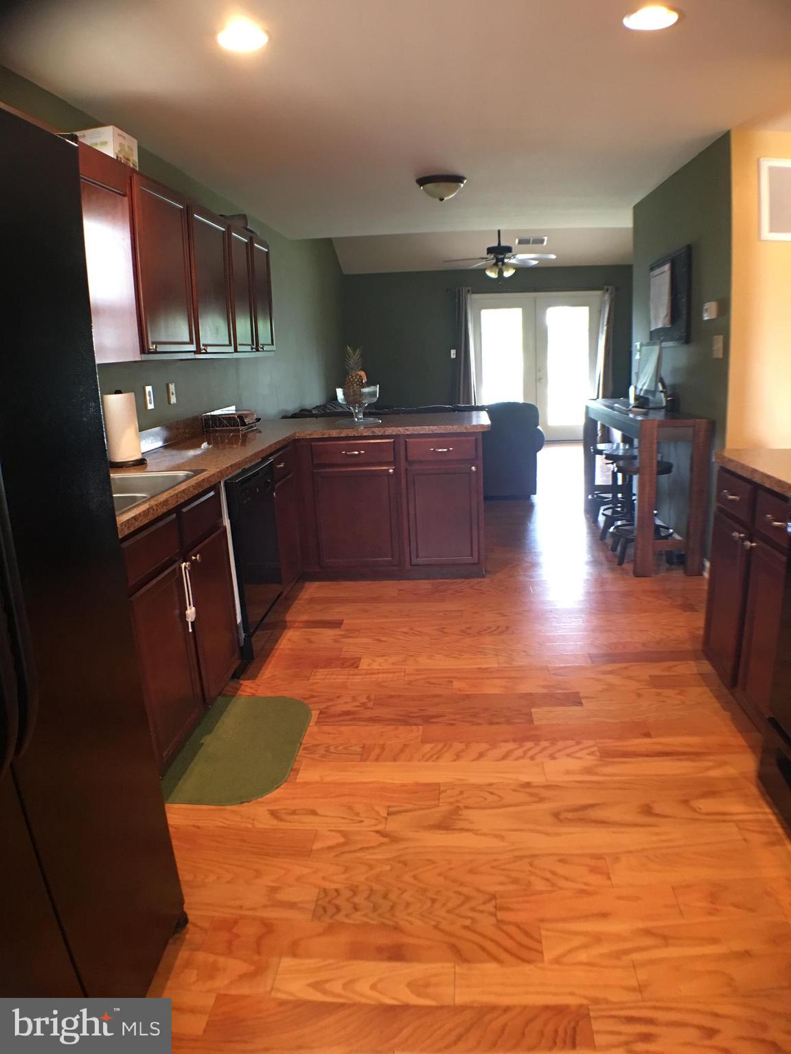 516 Thumper Drive Ranson, WV 25438 - Photo 8 of 38 kitchen to family room