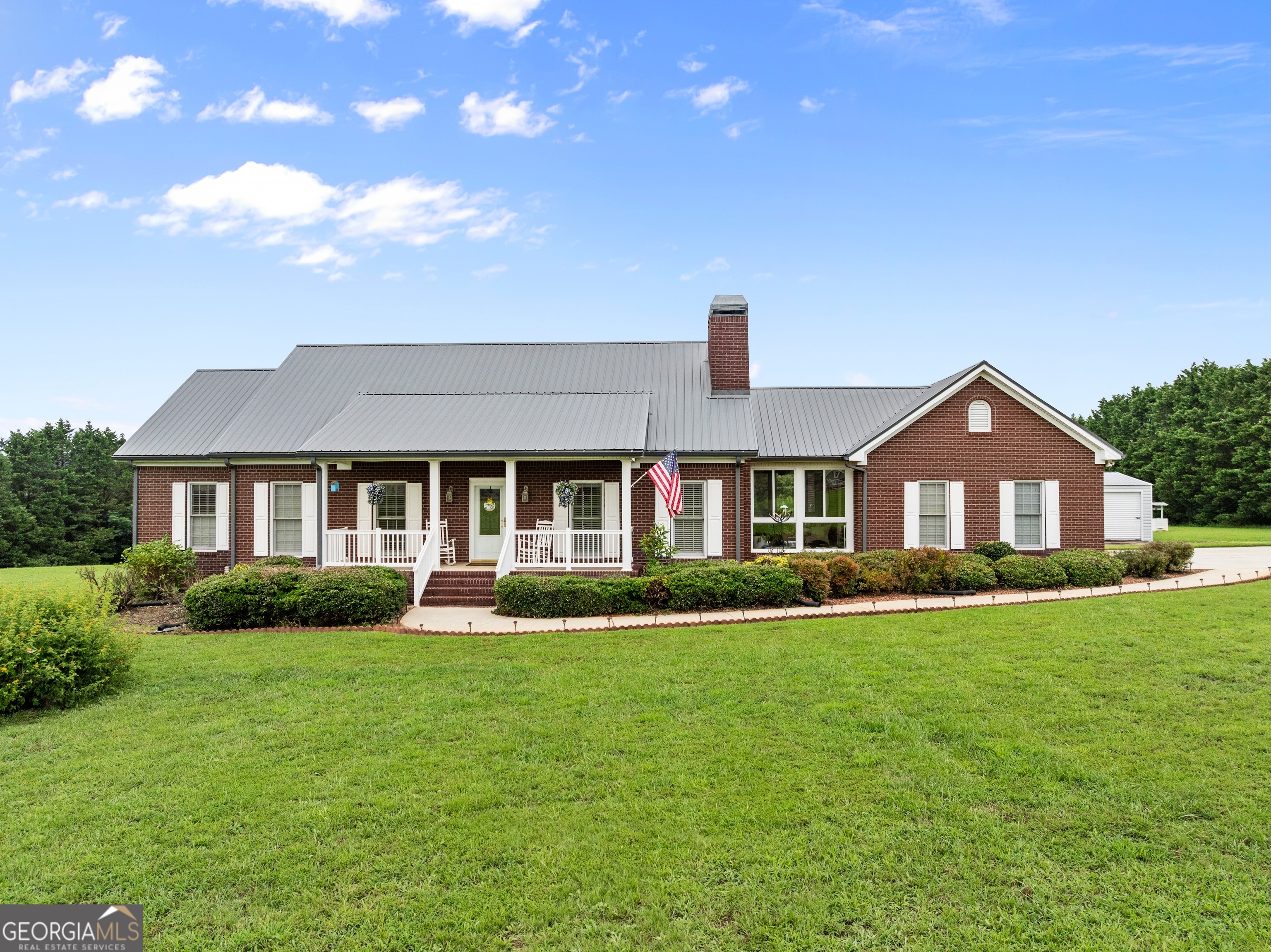 374 Hanley Road Hull, GA 30646 - Photo 1 of 1 a front view of a house with a yard