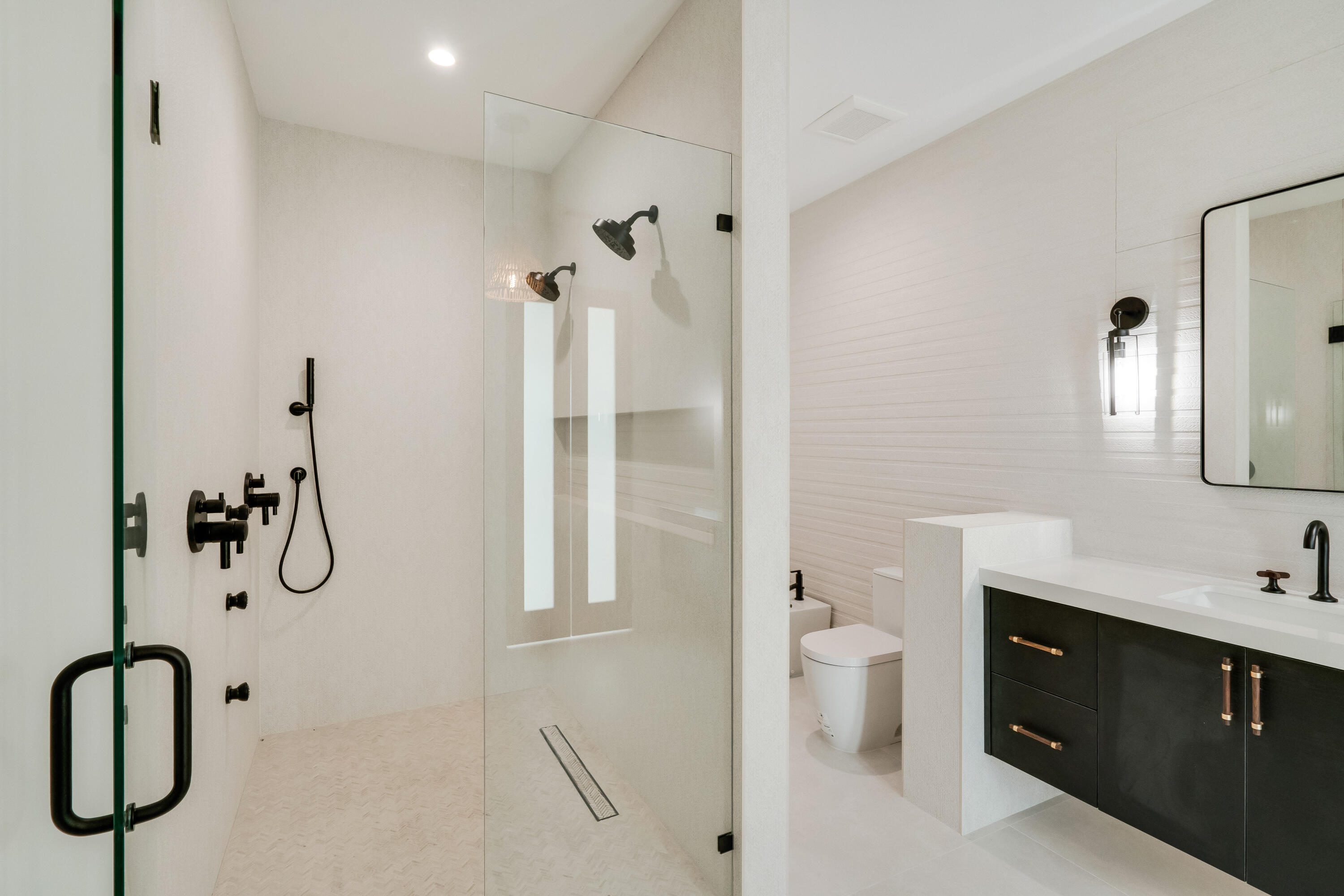 115 Spoonbill Road Tavernier, FL 33070 - Photo 33 of 85 a bathroom with a granite countertop sink a toilet and a mirror