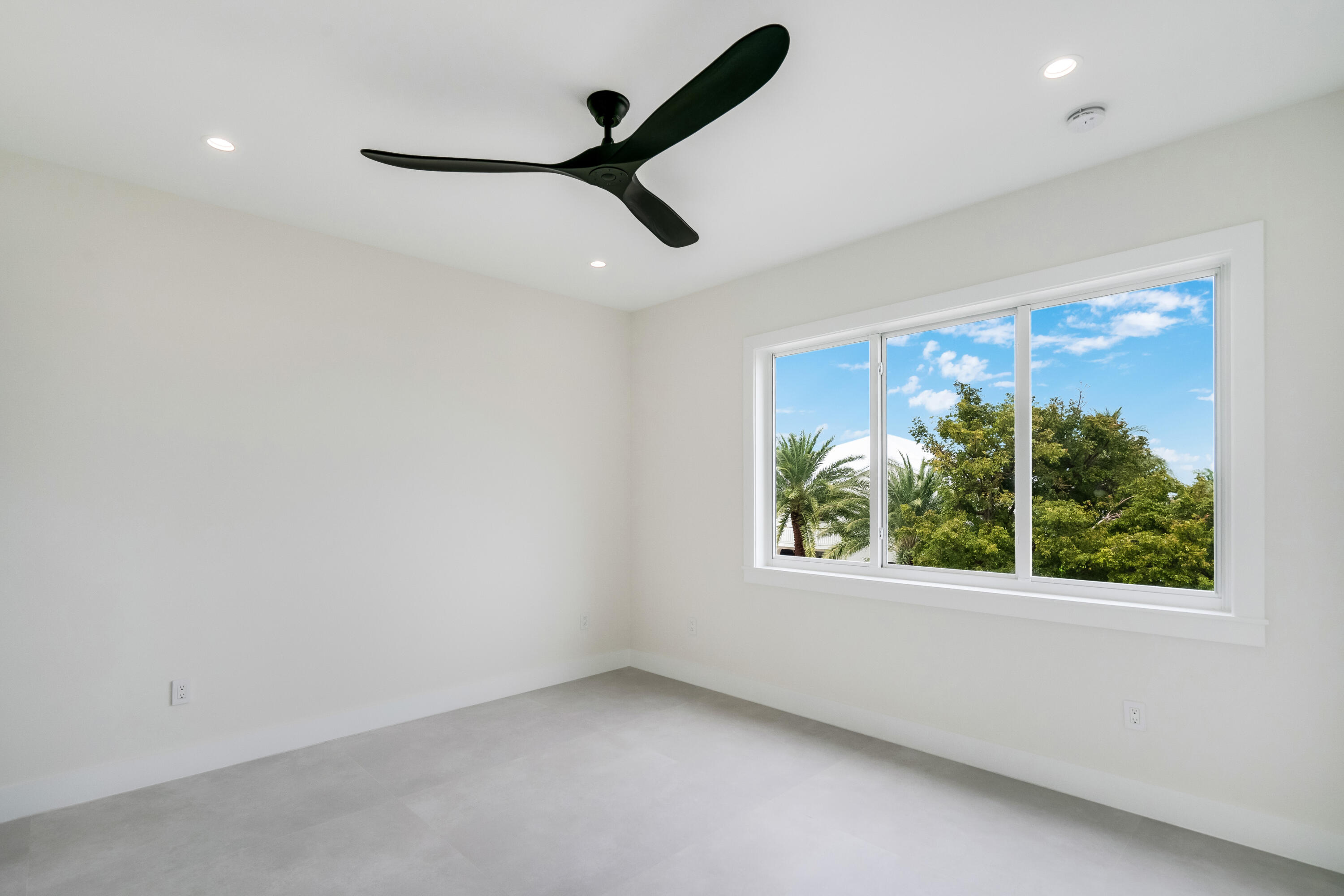 115 Spoonbill Road Tavernier, FL 33070 - Photo 48 of 85 an empty room with windows and