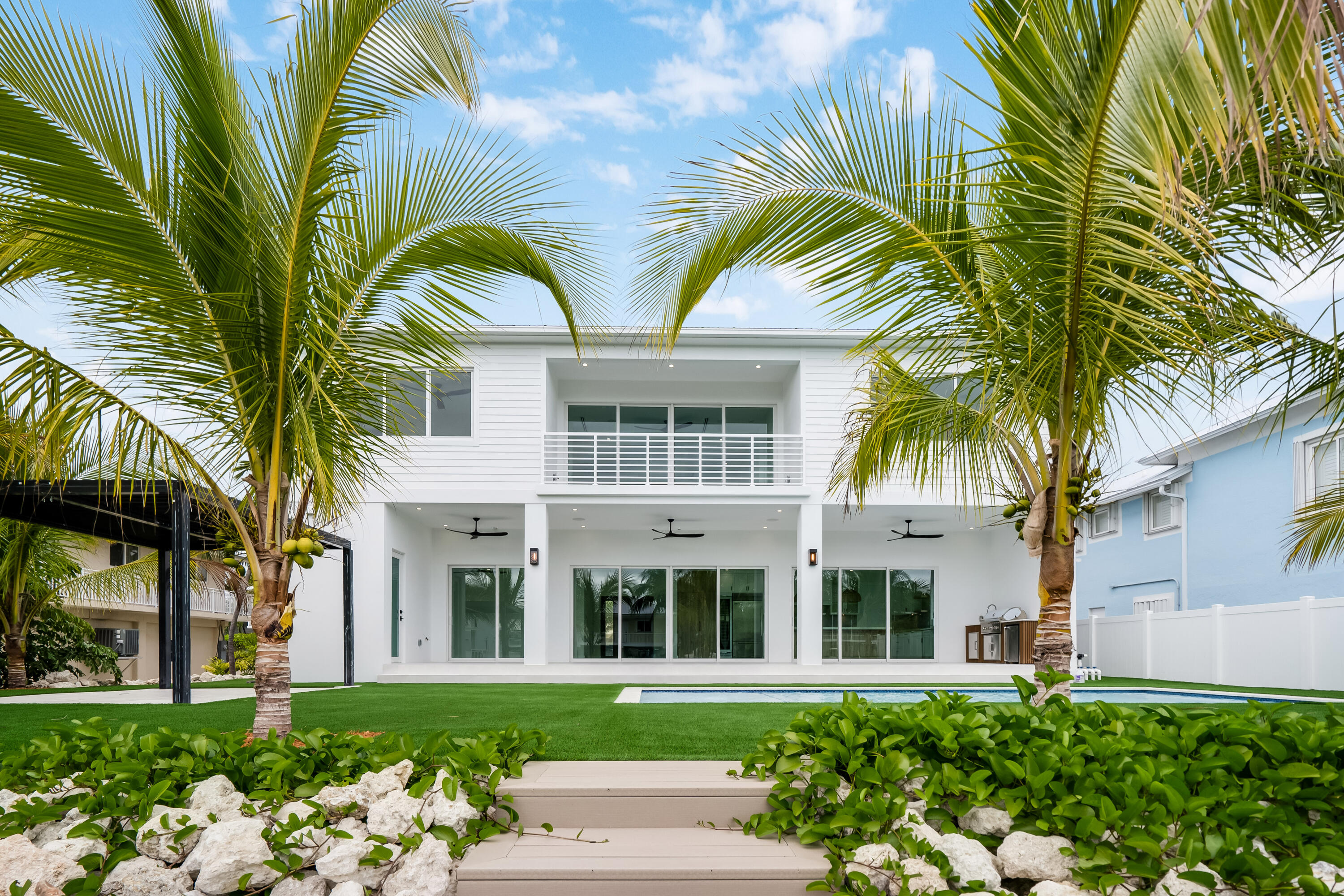 115 Spoonbill Road Tavernier, FL 33070 - Photo 67 of 85 a front view of a house with a garden