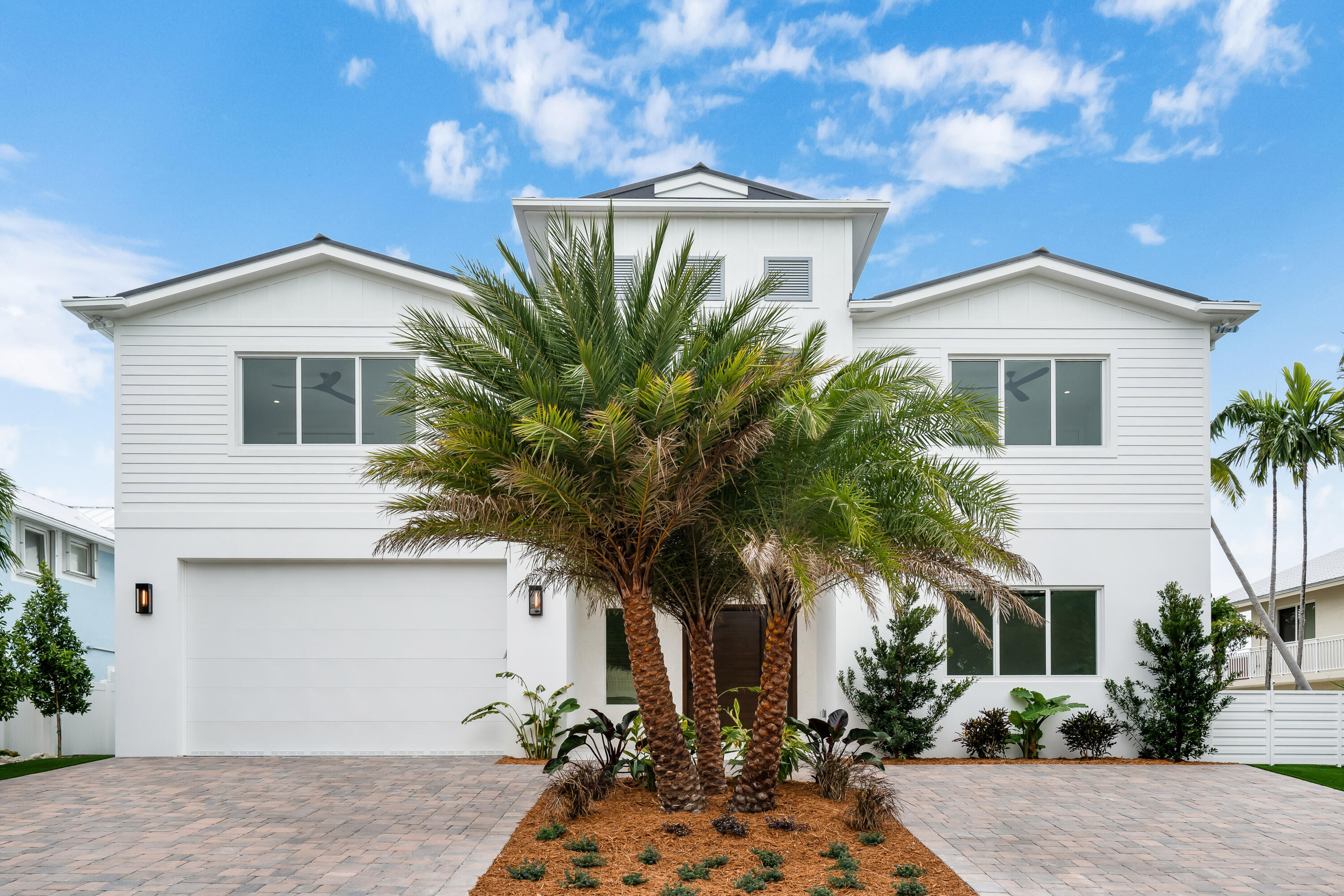 115 Spoonbill Road Tavernier, FL 33070 - Photo 84 of 85 a front view of a house with a yard