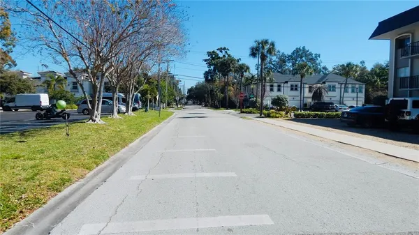 a view of a street with a building and a street view