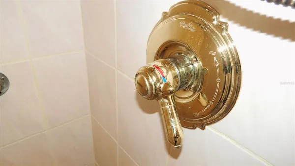 a white toilet sitting next to a white sink