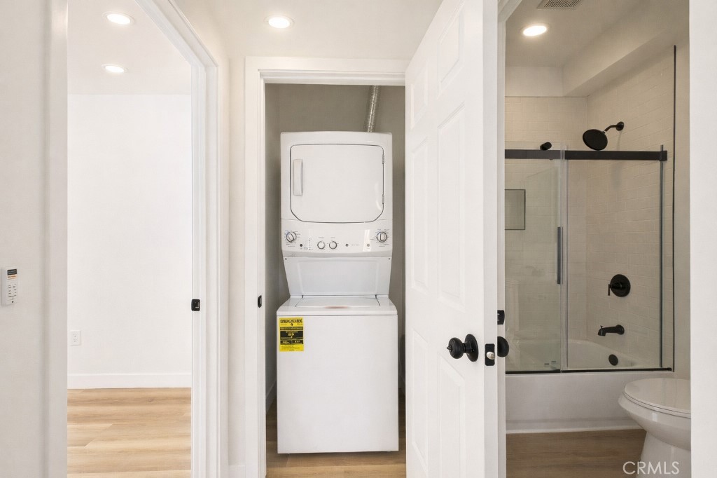 625 Orizaba Avenue, Unit 5 Long Beach, CA 90814 - Photo 9 of 12 a bathroom with a shower and a toilet