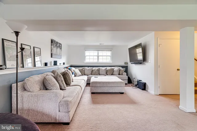 a living room with furniture and a couch