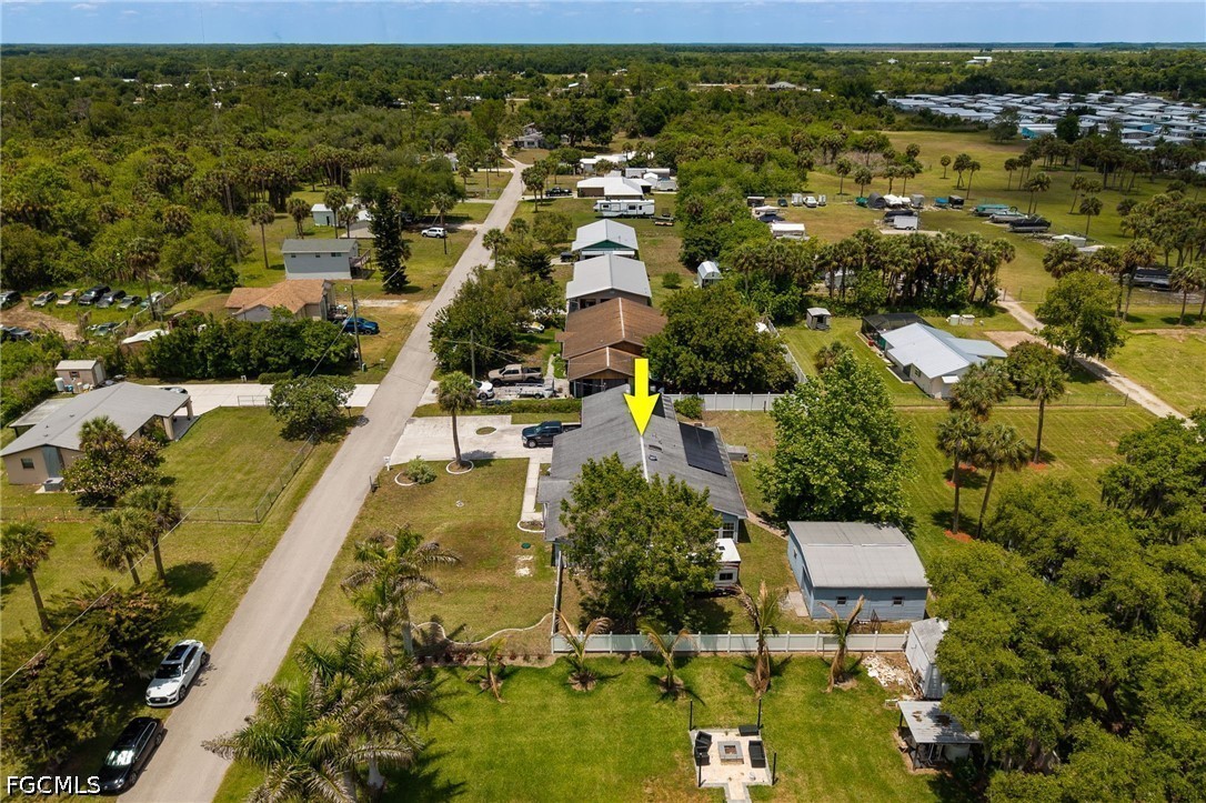 17290 Rewis Road Alva, FL 33920 - Photo 37 of 50 an aerial view of residential houses with outdoor space