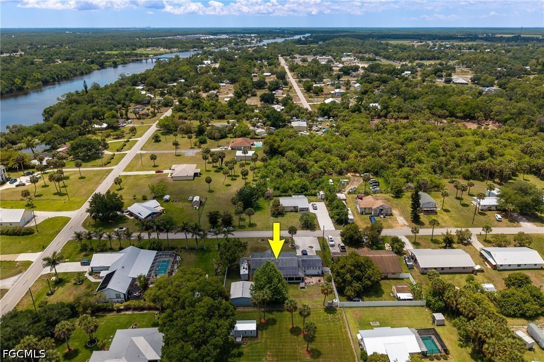 17290 Rewis Road Alva, FL 33920 - Photo 39 of 50 an aerial view of residential houses with outdoor space and river