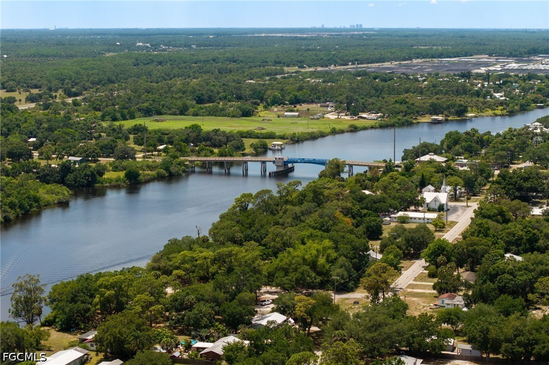 17290 Rewis Road Alva, FL 33920 - Photo 41 of 50 an aerial view of ocean and residential houses with outdoor space