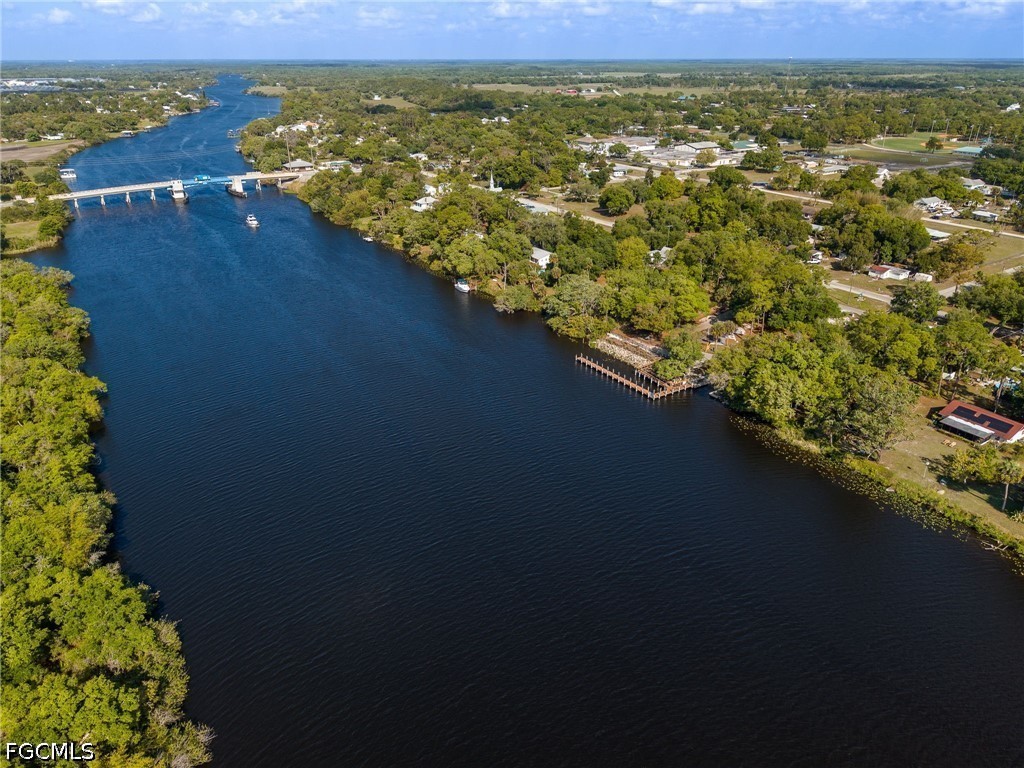 17290 Rewis Road Alva, FL 33920 - Photo 46 of 50 an aerial view of residential houses with outdoor space and ocean view