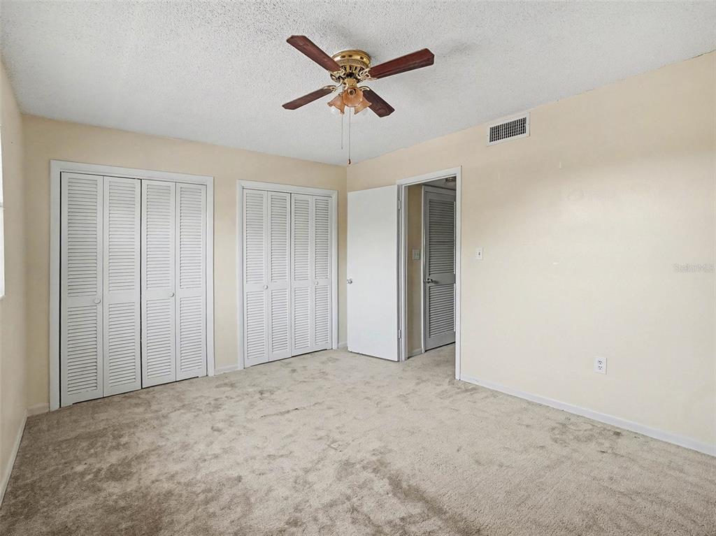 2500 Lee Road, Unit 237 Winter Park, FL 32789 - Photo 14 of 23 an empty room with closet and fan