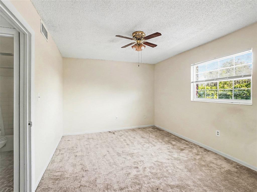 2500 Lee Road, Unit 237 Winter Park, FL 32789 - Photo 16 of 23 a view of a big room with wooden floor and closet