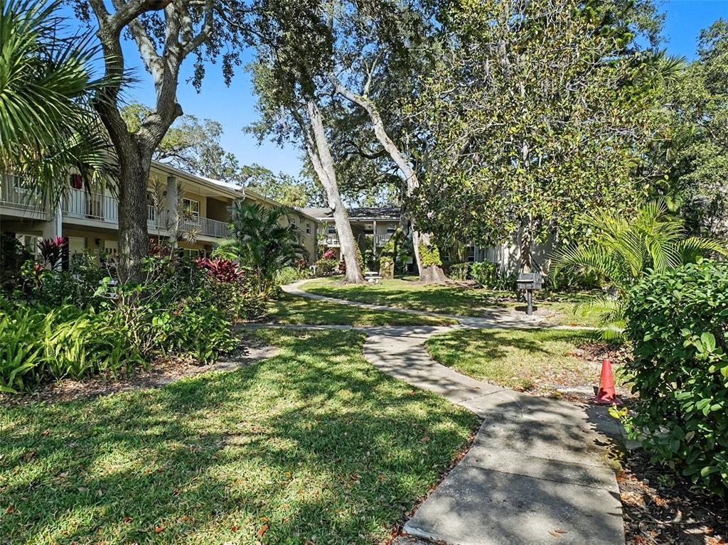 2500 Lee Road, Unit 237 Winter Park, FL 32789 - Photo 17 of 23 a view of a house with a yard