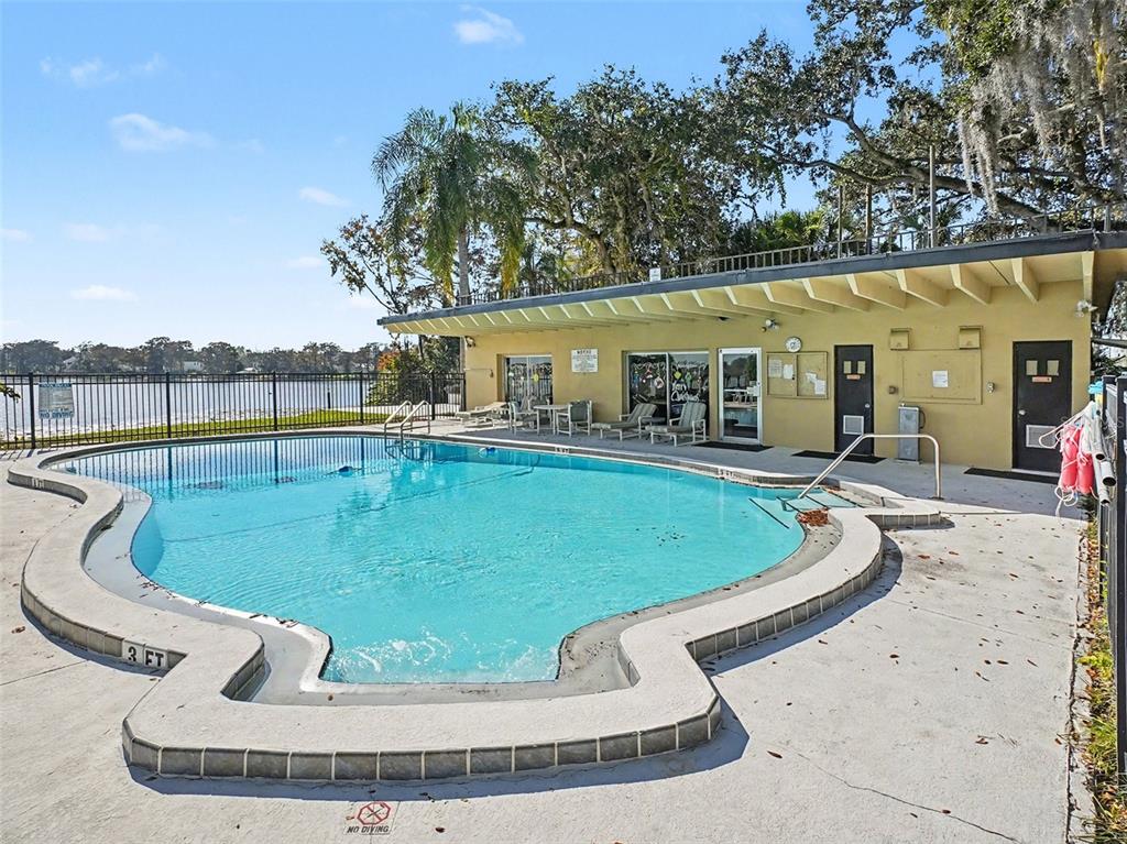 2500 Lee Road, Unit 237 Winter Park, FL 32789 - Photo 20 of 23 a view of a swimming pool with a patio