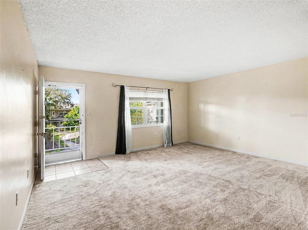 2500 Lee Road, Unit 237 Winter Park, FL 32789 - Photo 6 of 23 an empty room with windows