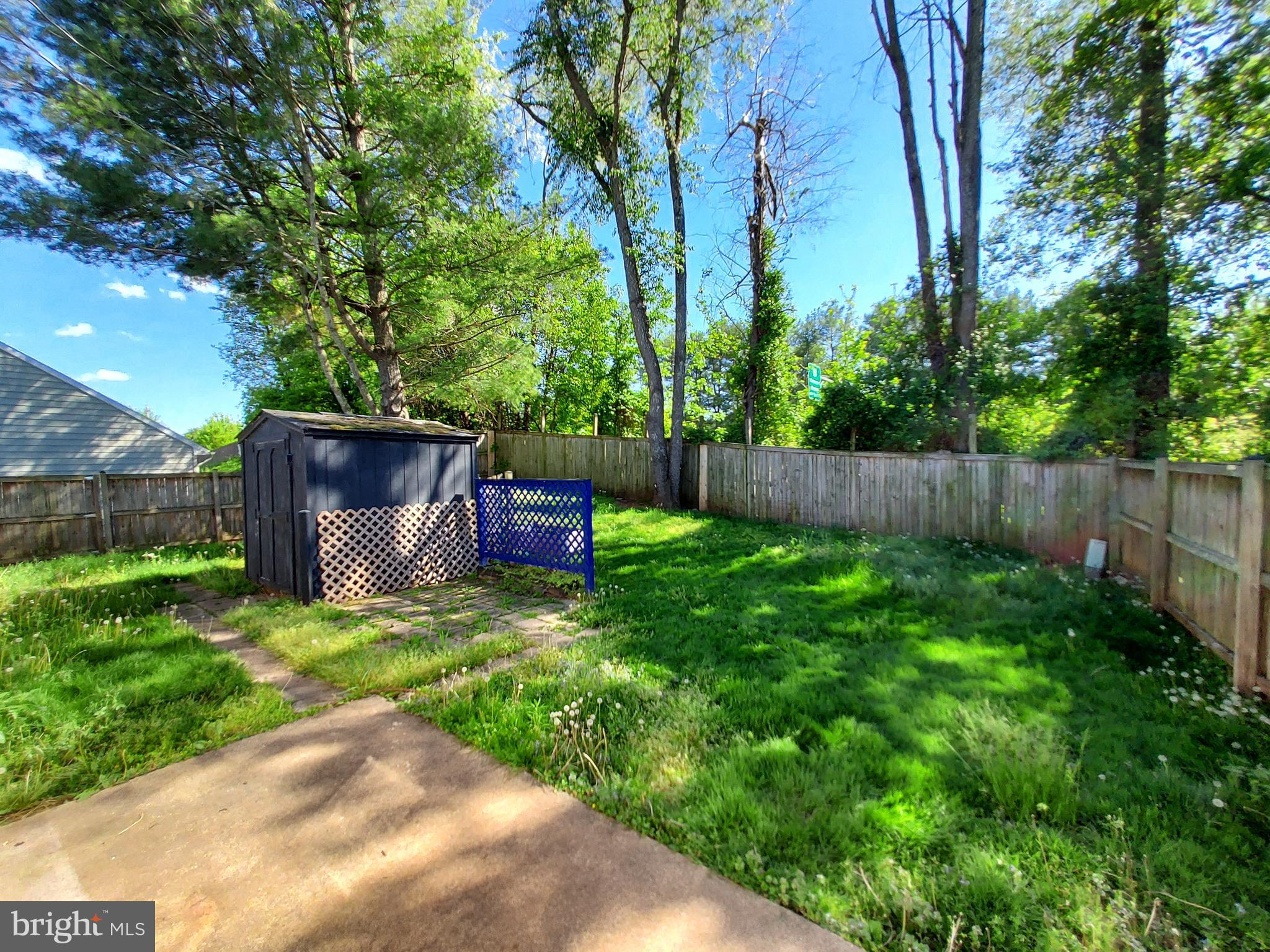 792 Ripplebrook Drive Culpeper, VA 22701 - Photo 10 of 12 Fenced yard with shed